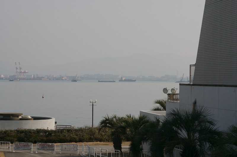 Pictures of some boats out in the hazy distance from the aquarium patio.