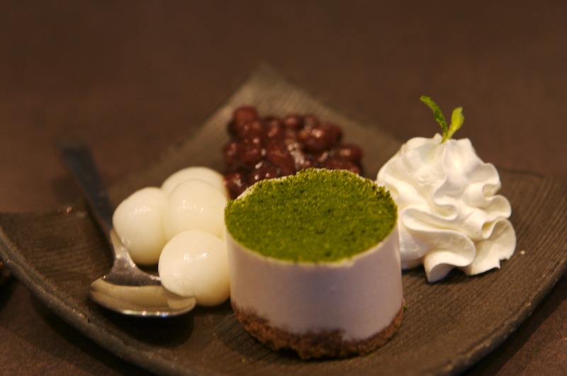 Chunmeng had this for desert. Sweet beans, whipped cream, some sort of cheesecake with green tea topping and I'm not sure what the white looking balls are.