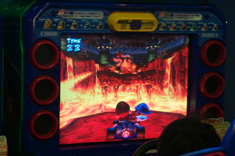 A guy is fighting King Koopa boss after winning enough races.