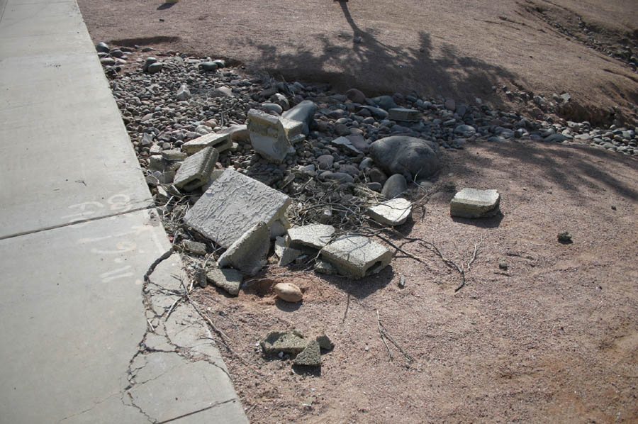 Bricks that made it across the street to the park's spillway